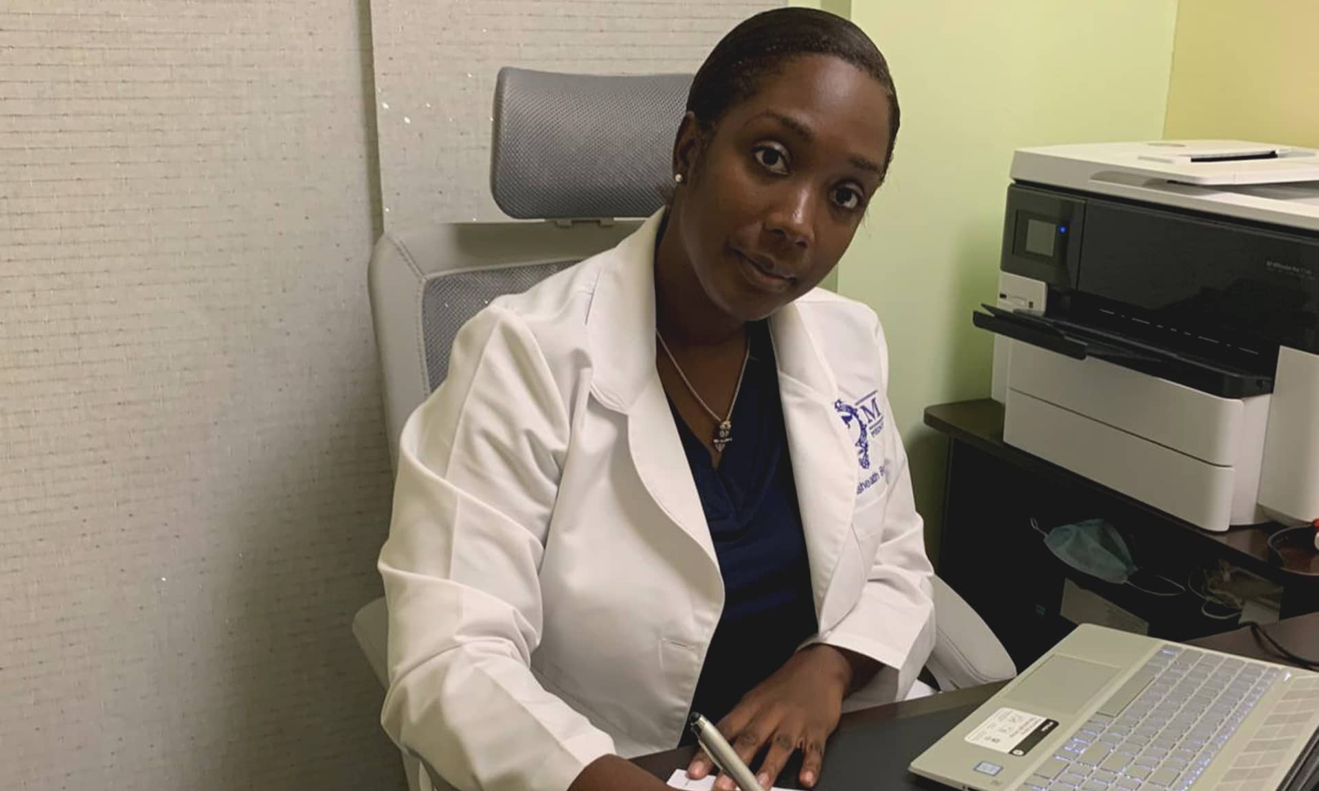 Dr. Bowen at her desk